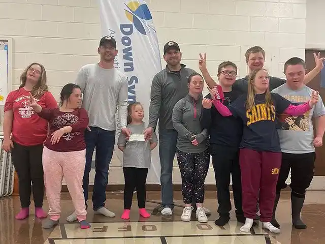 2023 charitable donation presentation for the Down Syndrome Foundation